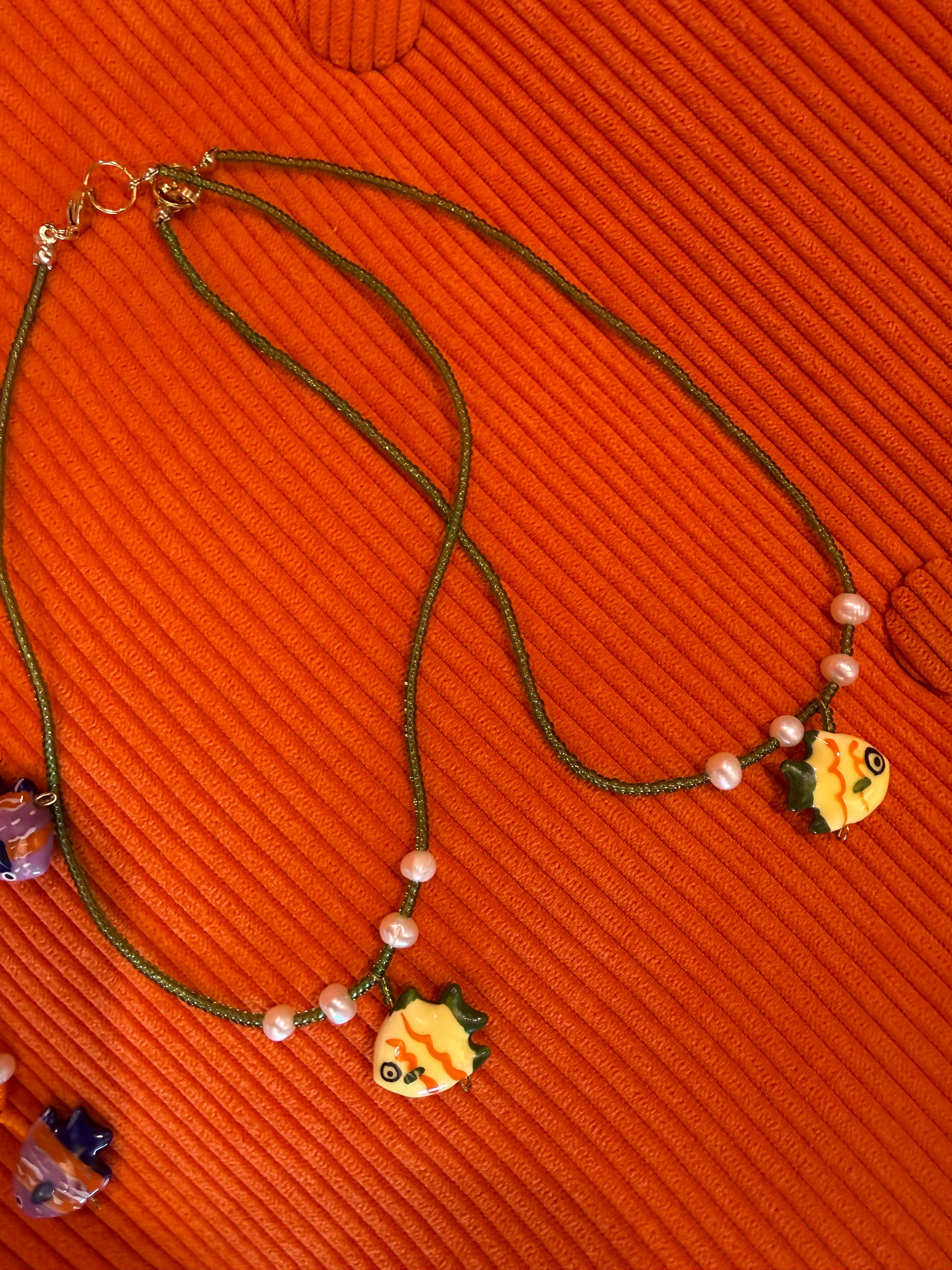 Perlebelle collana pesce