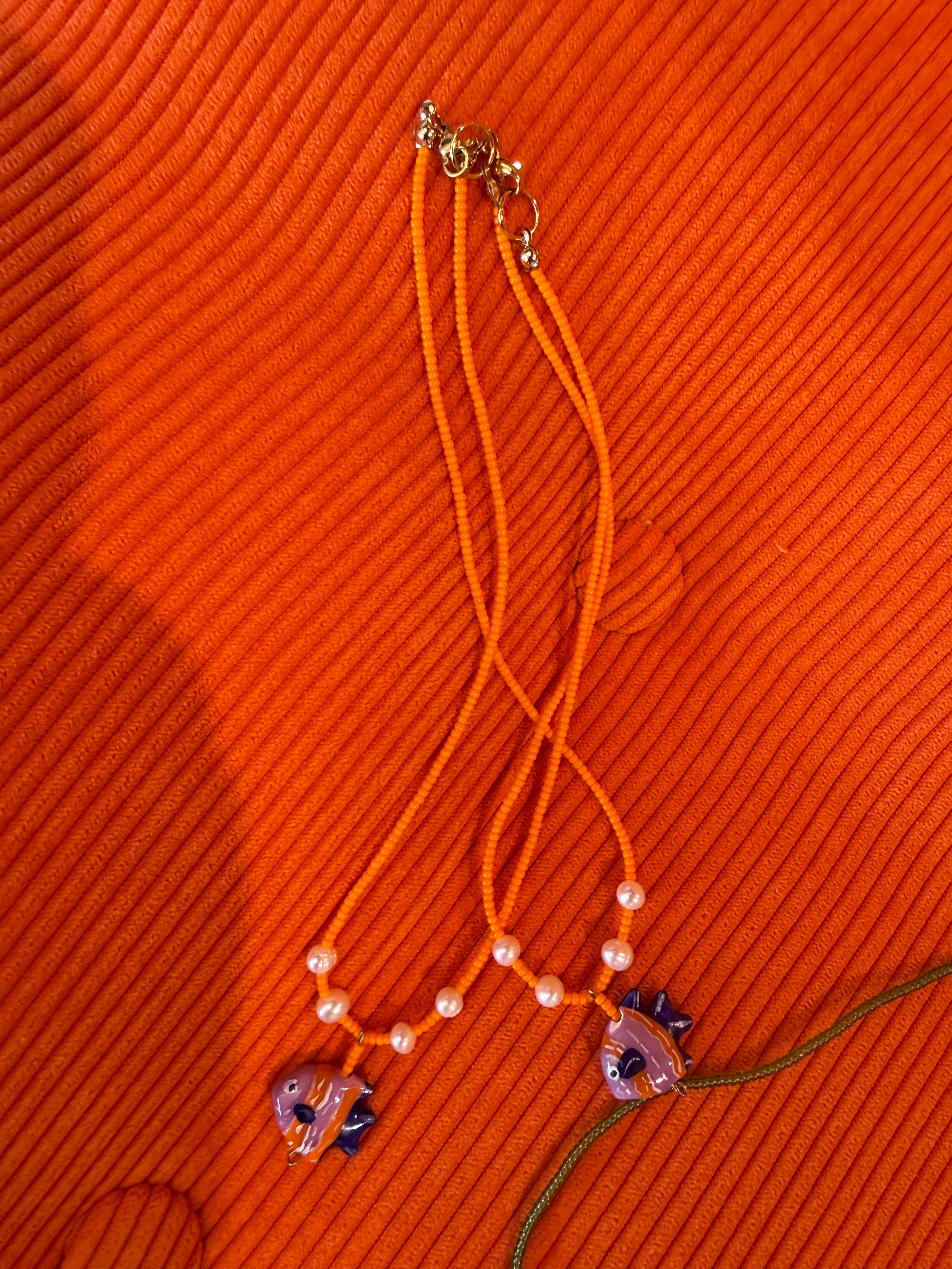 Perlebelle collana pesce